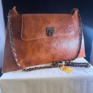 Boutique style crossbody or shoulder bag.